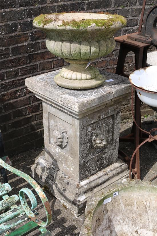 Re-constituted stone urn on plinth(a/f)